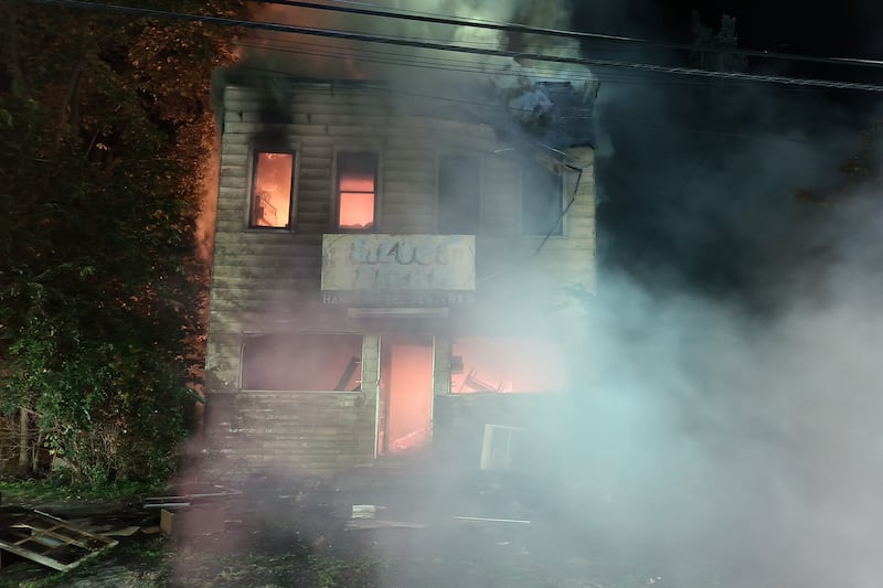 Building left demolished after defensive strategies were used to contain the fire