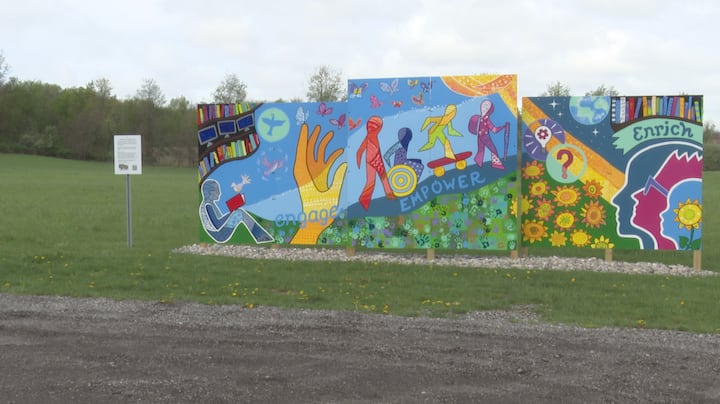 DeWitt District Library unveils new community mural