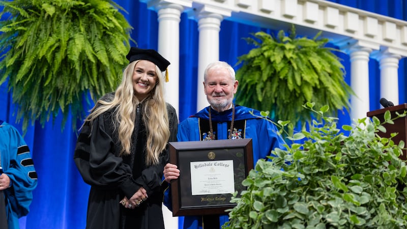 Erika Kirk receives honorary degree at Hillsdale College Commencement in the Biermann Center...